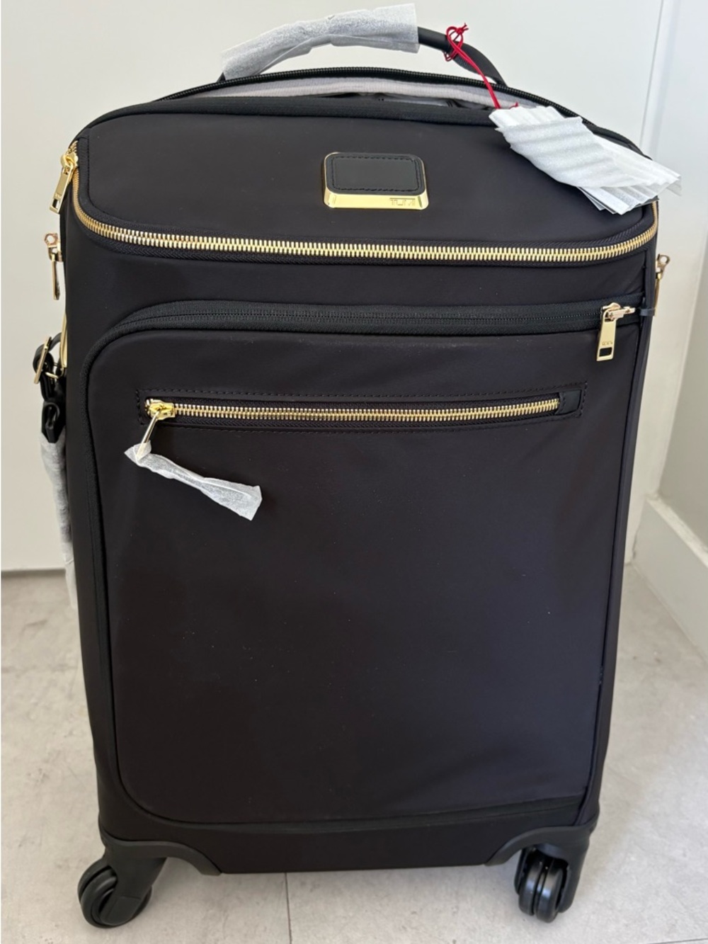Tumi International Carry-On Spinner Suitcase Black with Gold Hardware